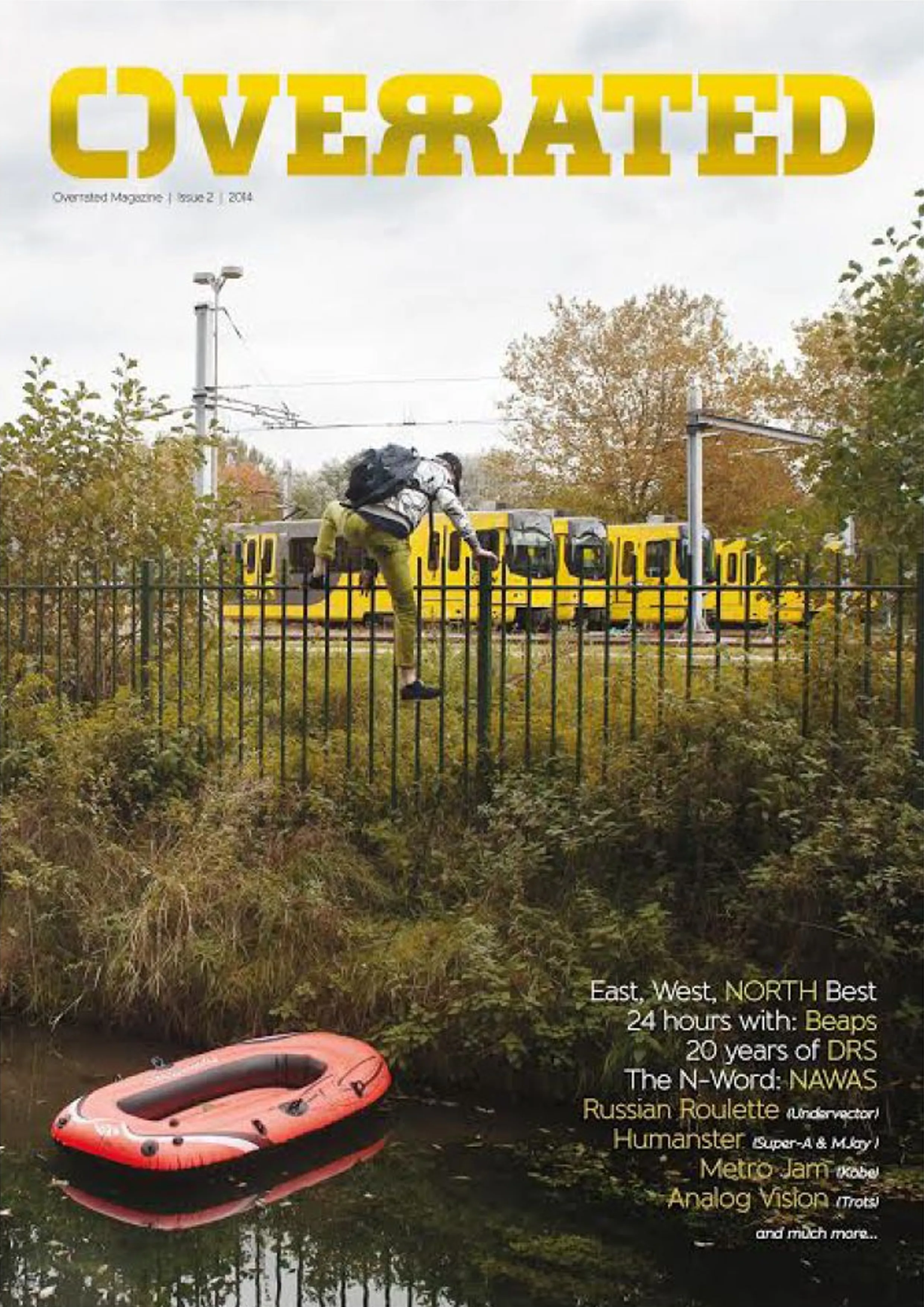 The cover of Overrated Magazine issue #2 showing someone climbing the fence of a tram yard after crossing a canal with an inflatable boat